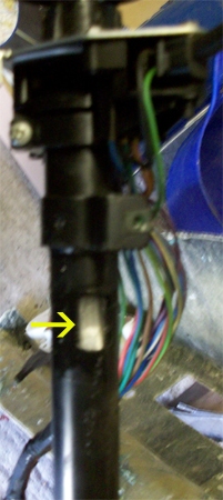 Slot in steering column for ignition lock